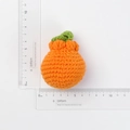 Handmade crochet orange fruit keychain charm with green leaves measuring 6cm by 5cm size - Large Ugly Tangerine Doll