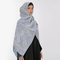 Elegant blue paisley pattern scarf with fringe tassels worn by a model in soft lighting - Blue Paisley (T482-04)