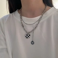 Double-layered necklace with black and white checkered bear pendant on silver chain - Silver Bear
