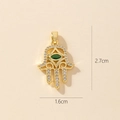Golden Hamsa hand pendant with green gem and rhinestones, size 2.7cm by 1.6cm - Gold Hamsa Hand Green Gem Eye Pendant (25-9)