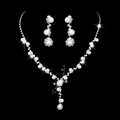 Detailed close-up of bridal necklace and earring set with pearls and rhinestones on black background - Silver White Artificial Pearl Necklace and Stud Earrings Set (483)