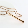 Mindful ademhalingsketting met een minimalistische roségouden cilinderhanger - Roségoud