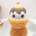 Squishy slow-rebound ice cream cone toy with cartoon face and chocolate drizzle - Expression Ice Cream Cone
