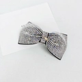 Close-up of sparkling full rhinestone bow hair clip with silver crystals on black base - 8cm Medium Single Knot Gradient White Rhinestone