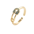 Verstellbarer goldener Sicherheitsnadel-Ring mit hellblauen Steinen im modernen Design - Anstecknadel-Stil / Hellblau