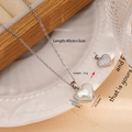 Collana a cuore in acciaio al titanio con lato in opale e l'altro con zirconi bianchi - Cuore Doppio Lato 2580