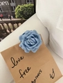 Elegant denim blue camellia flower hair claw clip with layered fabric petal texture - Blue