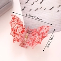 Bat-shaped hair claw clip in red marble acrylic for Halloween, size 8.5cm by 5cm - Red & White Marble