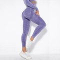 Detailed macro view of purple acid wash seamless yoga pants with high waist ribbing texture - Washed Purple