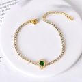 Elegant gold tennis bracelet with pear-cut emerald and sparkling zircon accents - Green Zircon Waterdrop