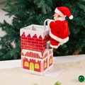 Elektrischer kletternder Weihnachtsmann auf Schornstein mit festlichem Dekor - Weihnachtsmann klettert den Schornstein hoch