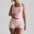 Pink ribbed knit yoga set featuring high-waist shorts and a wide strap sports bra - S / Sakura Pink