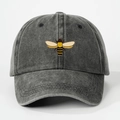 Close-up of the detailed bee embroidery on a dark grey washed cotton baseball cap - One Size / Black