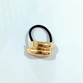 Minimalist gold alloy hair tie with a polished curved metal arc and black elastic band - Gold