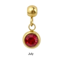 Detailed view of July birthstone gold charm bead with faceted red crystal inlay - Gold - July