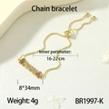 18K gold MAMA letter chain bracelet featuring colorful cubic zirconia on textured background - BR1997-K (MAMA Bar)