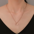 Minimalist butterfly pendant necklace in rose gold finish on elegant neck clavicle - Gold-Tone Mesh Textured Butterfly Pendant (KC Gold 11465)