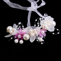 Close-up of handmade floral headband with white pearls and purple fabric petals - Iron Wire Bracelet / Purple