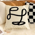 Bohemian cream cushion cover with black tufted abstract lines on white faux fur carpet - Canvas Lines