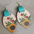 Detail of bohemian sunflower print on wood earrings with teal leather connectors - Sunflower Red Flower Teal Leather Style