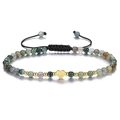 Detailed close-up of mixed stone beaded bracelet with a gold heart charm and black cord - India Agate