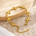 Polished 18k gold plated stainless steel bracelet featuring elegant cross-shaped links - Cross Style