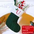 Green knit Christmas stocking with white cuff and red embroidered letter U decoration - Letter U / Dark Green