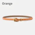 Smalle damesriem van echt leer in oranje met een matte, onregelmatige gouden gesp - 105cm / Oranje
