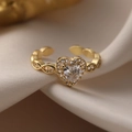 Adjustable gold plated heart ring featuring a central zircon and halo on satin background - Adjustable Open / 13705/Pave Heart