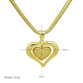 Close-up of gold heart pendant with crystal inlay, size 30x36mm, weight 9.3g on snake chain - Double Heart Gold Pendant