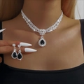 Elegant bridal jewelry set featuring a silver necklace and black drop earrings on a model - Black 211-Classic Water Drop