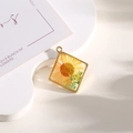 Ciondolo quadrato dorato in resina con fiori gialli secchi e foglie verdi per gioielli - Girasole giallo quadrato