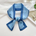 Navy and sky blue floral pattern silk scarf tied in a stylish knot for hair or bags - Sapphire Blue