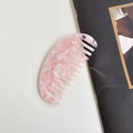Cellulose acetate hair comb featuring an elegant pink marble texture on a white surface - Sakura Pink Oval