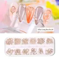 12-grid box with gold hollow geometric heart and square alloy nail art studs set - Alloy Long Box 04#(F773-4)
