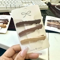Mocha brown seamless comb hair clips set of three on white packaging card - Comb Style / Set of 3
