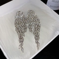 Detailed view of silver feather earrings with pavé crystals in a white gift box - Silver Post Feather Style (36#) / Silver