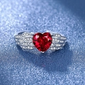 Silver-tone ring featuring a red heart-shaped gemstone and wing-style diamond accents - Red Diamond Ljz-204 / Adjustable Open