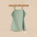 Close-up of mint green waffle cotton nursing cover with adjustable wooden buckle ring - Bean Green (Wooden Ring)