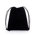 Detail of soft black velvet texture and drawstring closure on a jewelry storage pouch - Black