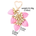 Pink simulation strawberry keychain charm with gold heart clasp and leaf details - K00904-02 Pink Multi-Pendant Strawberry Keychain (Heart)
