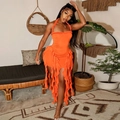 Detail of orange halter dress featuring ruffled layers and elegant fringe trimming - S / Orange Red
