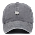 Close-up of white tooth embroidery on a washed dark gray vintage baseball cap - Gray