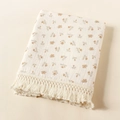 Macro view of double-layer cotton gauze baby blanket with floral prints and tassel trim - Retro Brown Floral (a1)