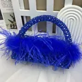 Detail of handcrafted dark blue beaded evening bag featuring ostrich feathers and top handle - Sapphire Blue