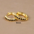 Detailed macro view of 9mm gold earrings featuring black cubic zirconia pavé setting - 9mm Gold Black Rhinestone (E1014-9mm)