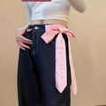 Pink polka dot silk bow accessory tied on dark blue denim jeans for a stylish waist accent - 11# Pink