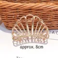 Pinza per capelli a ventaglio dorata media