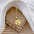 Macro shot of gold pendant with heart-shaped crystal center and sparkling outer ring - Gold Sacred Heart Cross Pendant (C304)