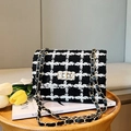 Classic tweed chain shoulder bag with black and white plaid pattern and gold lock - Black